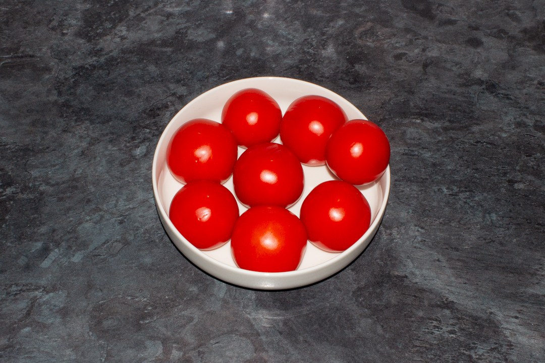 A dish of tomatoes at room temperature