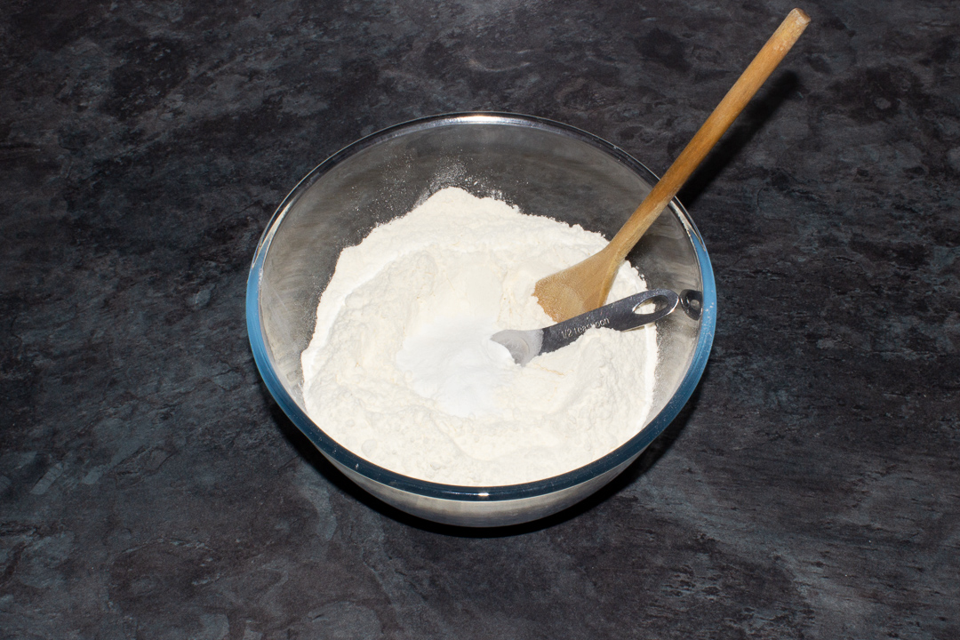 Baking powder and flour in a large bowl
