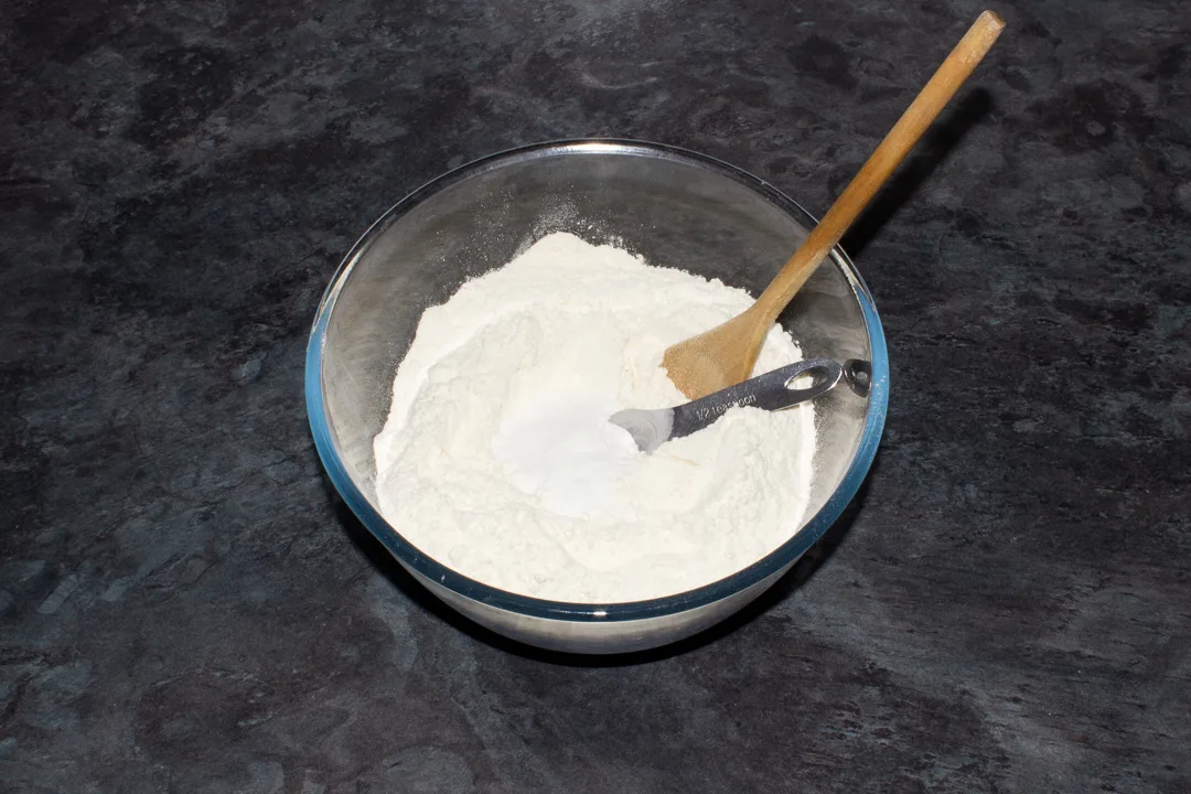 Baking powder and flour in a large bowl