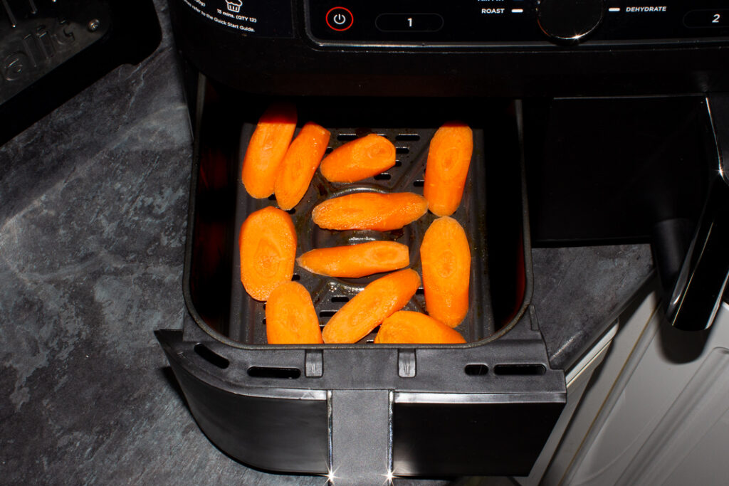 Prepared carrot diagonals in an air fryer