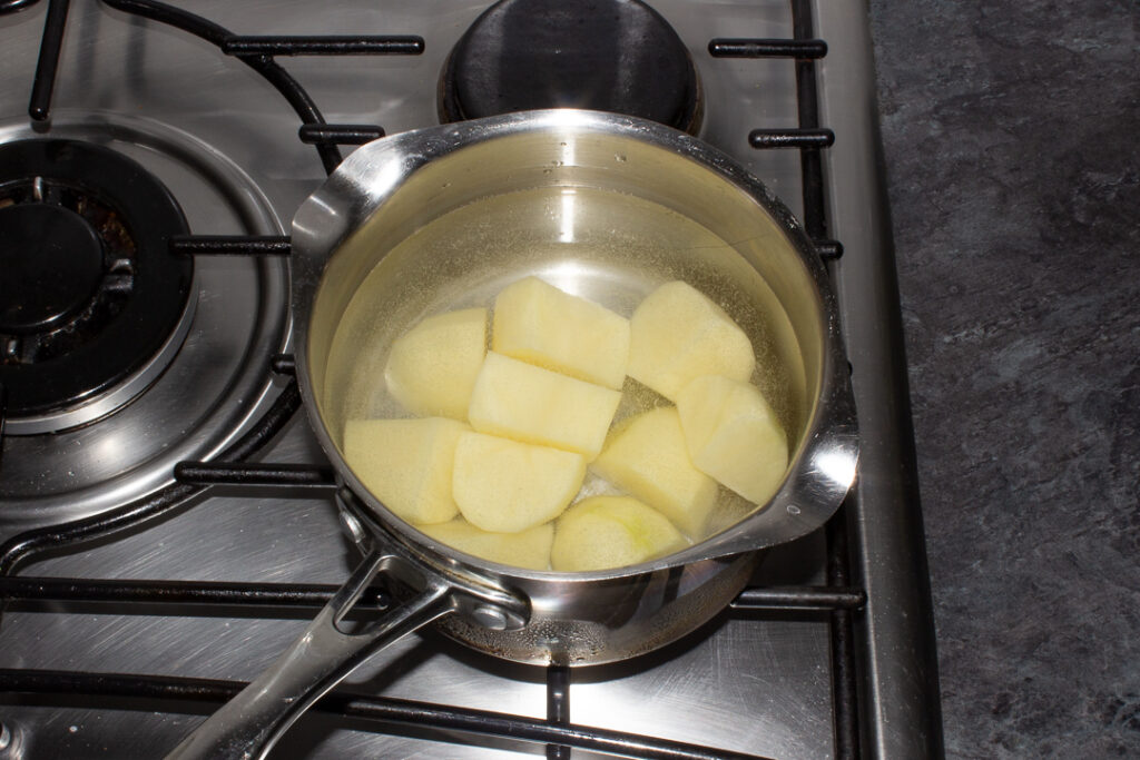 potatoes in a pan of water