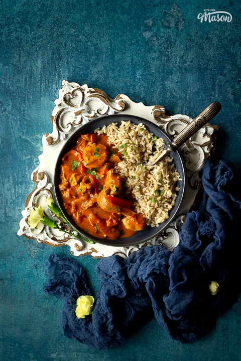 Close up of air fryer chicken thigh curry on a plate