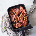 Crispy bacon in an air fryer drawer