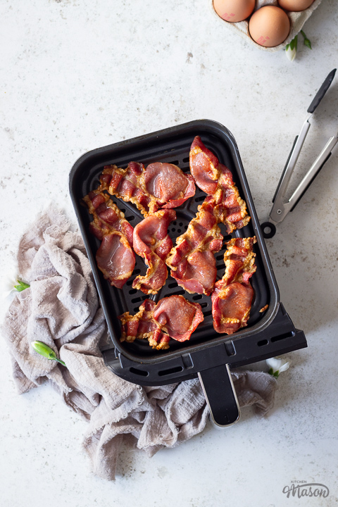 Crispy bacon in an air fryer drawer