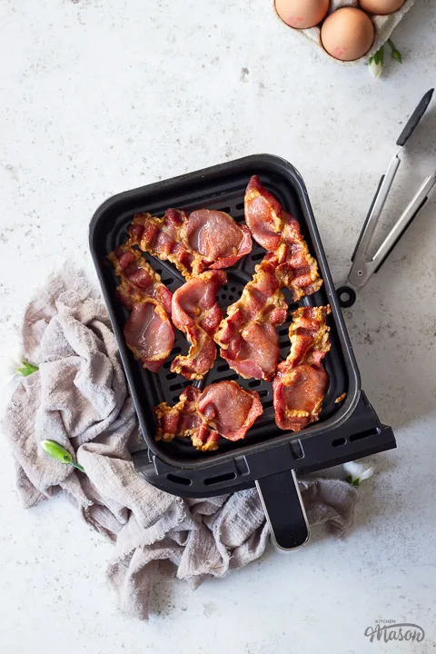 Crispy bacon in an air fryer drawer