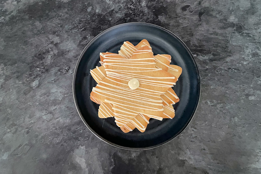 christmas cookie tree being built on a plate