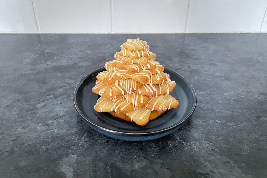 christmas cookie tree being built on a plate