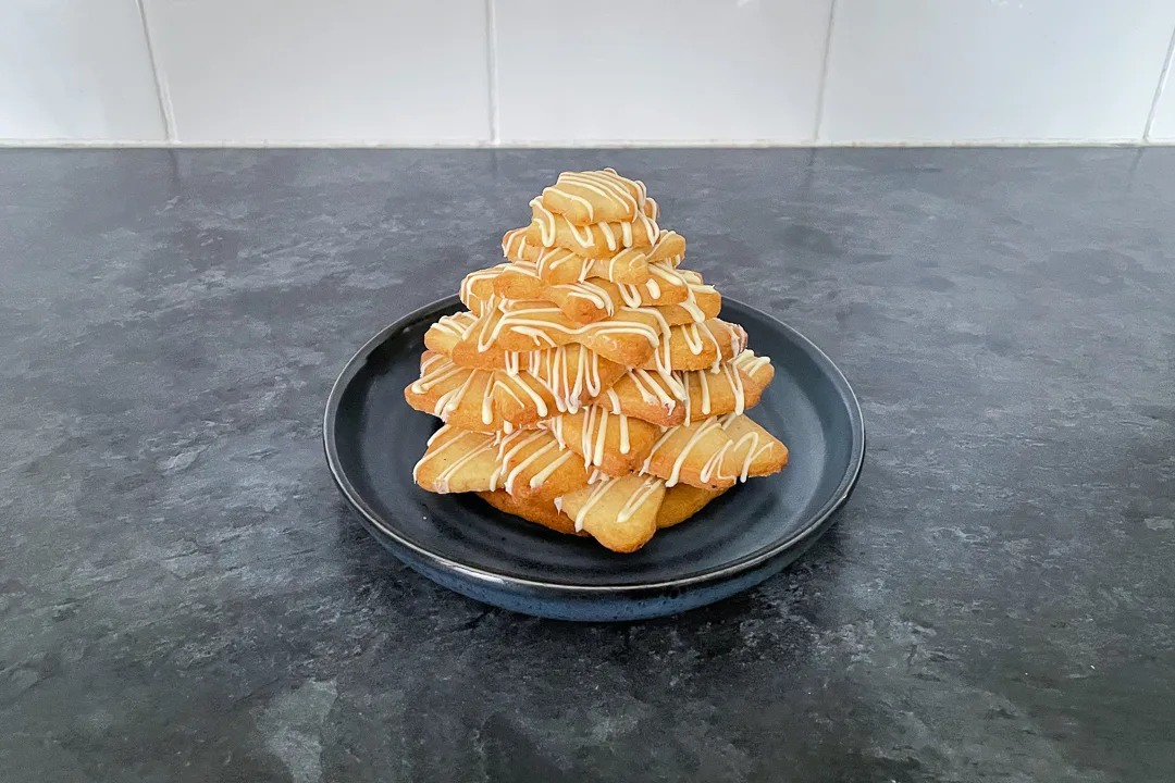 christmas cookie tree being built on a plate