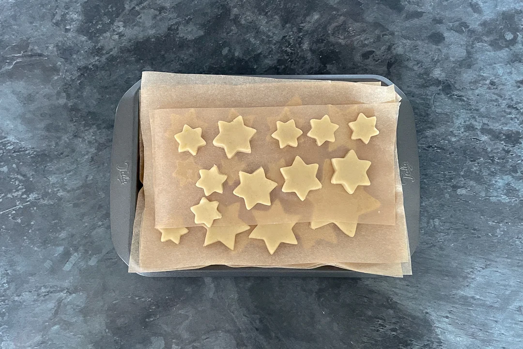 cookie shapes on a small baking tray