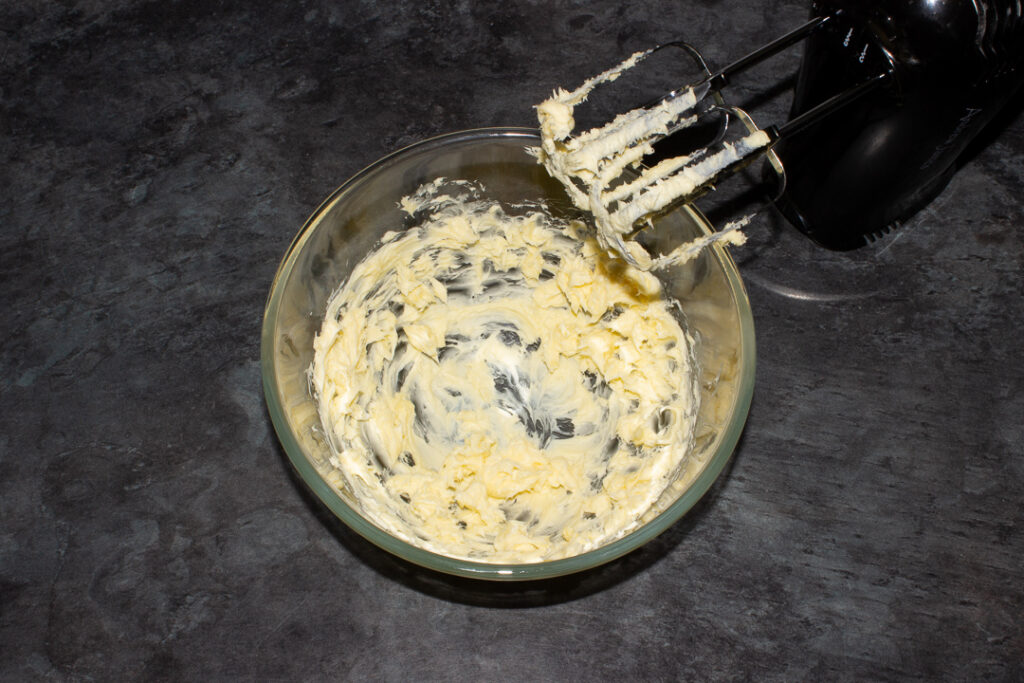 Creamed butter in a mixing bowl