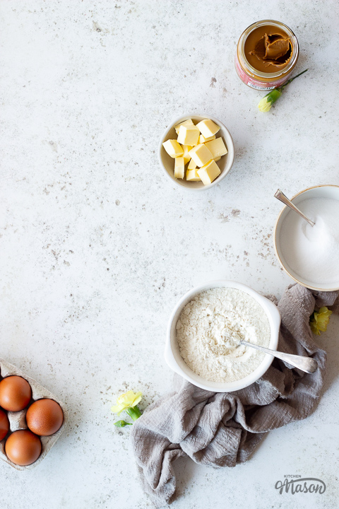 Cake ingredients in small bowls