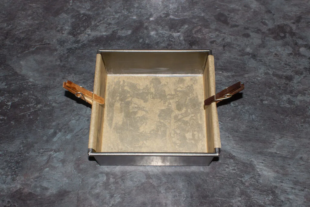 A lined square baking tin.