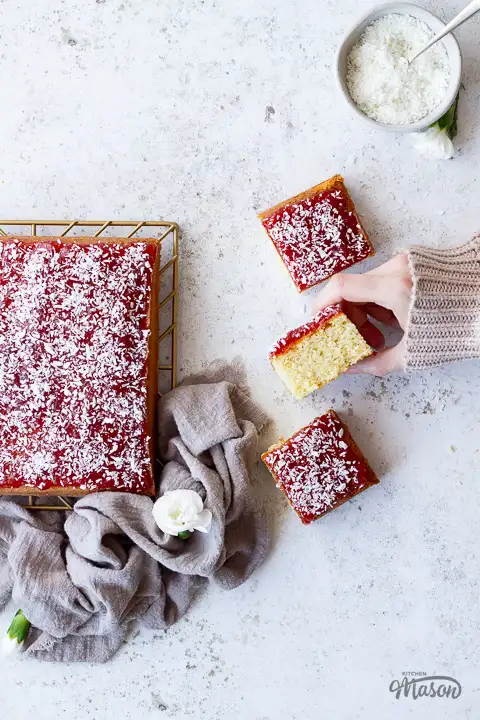 Coconut jam cake cut into slices.