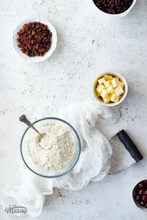 Raw fruit scone ingredients in bowls