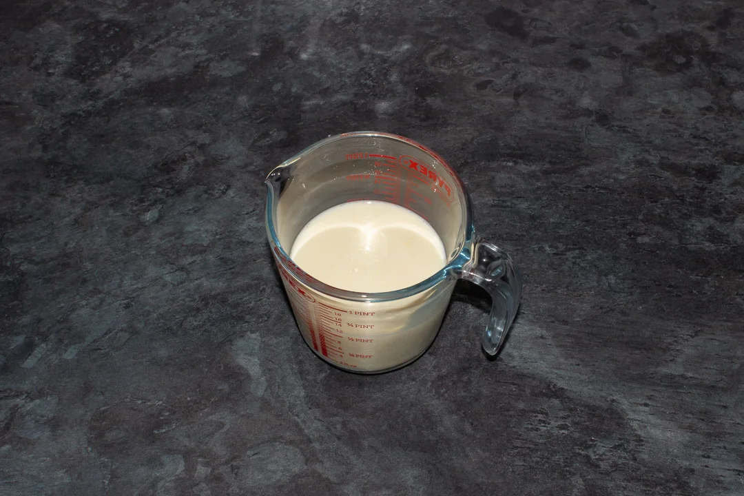 Egg and full fat milk in a jug