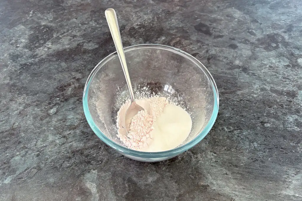 Blancmange powder and sugar in a bowl