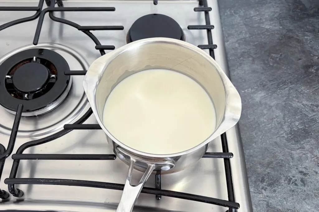 Milk warming in a saucepan