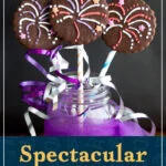 3 firework biscuits in a jar with colourful curling ribbon. A text overlay says "Spectacular firework biscuits".