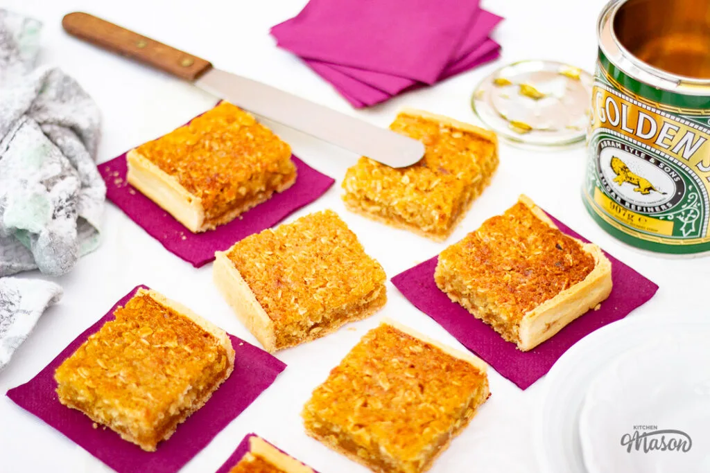 Treacle tart bars on napkins.
