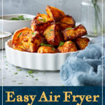 A white dish filled with air fryer roast potatoes that have been scattered with chopped fresh parsley. A text overlay says "Easy Air Fryer Roast Potatoes... 2 ways!".