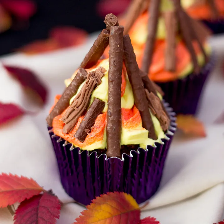 A bonfire cupcake in a purple cupcake case.