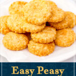 Cheese biscuits stacked up on a white plate. A text overlay says "Easy peasy cheese biscuits".