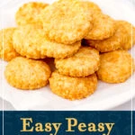Cheese biscuits stacked up on a white plate. A text overlay says "Easy peasy cheese biscuits".