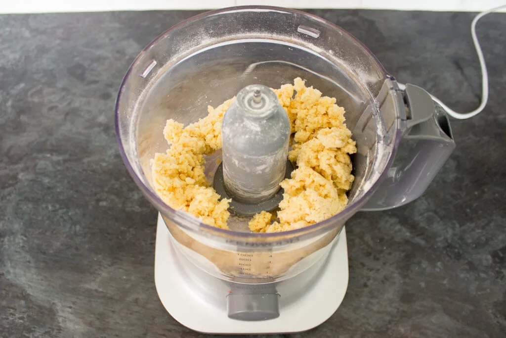 Biscuit dough in a food processor.