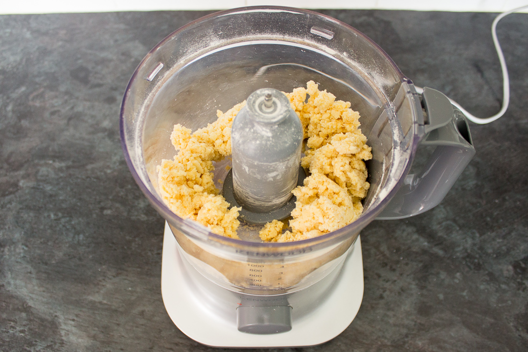 Cheese biscuit dough in a food processor.