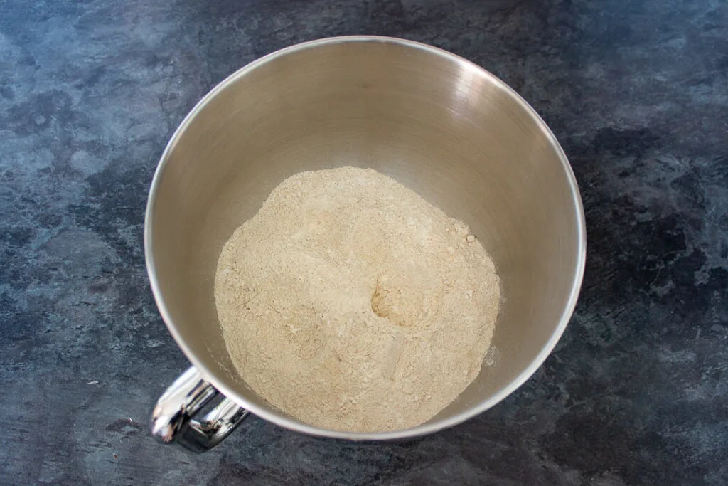 A bowl with dry ingredients in.