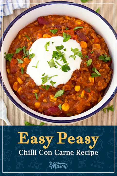 A bowl of chilli con carne and soured cream. A text overlay says "Easy peasy chilli con carne recipe".