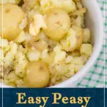 A bowl of crushed new potatoes topped with a knob of melting butter. A text overlay says "Easy peasy crushed new potatoes".