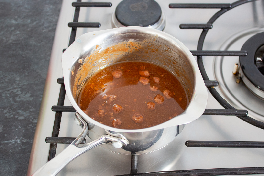 Mars Bars melting in a saucepan.
