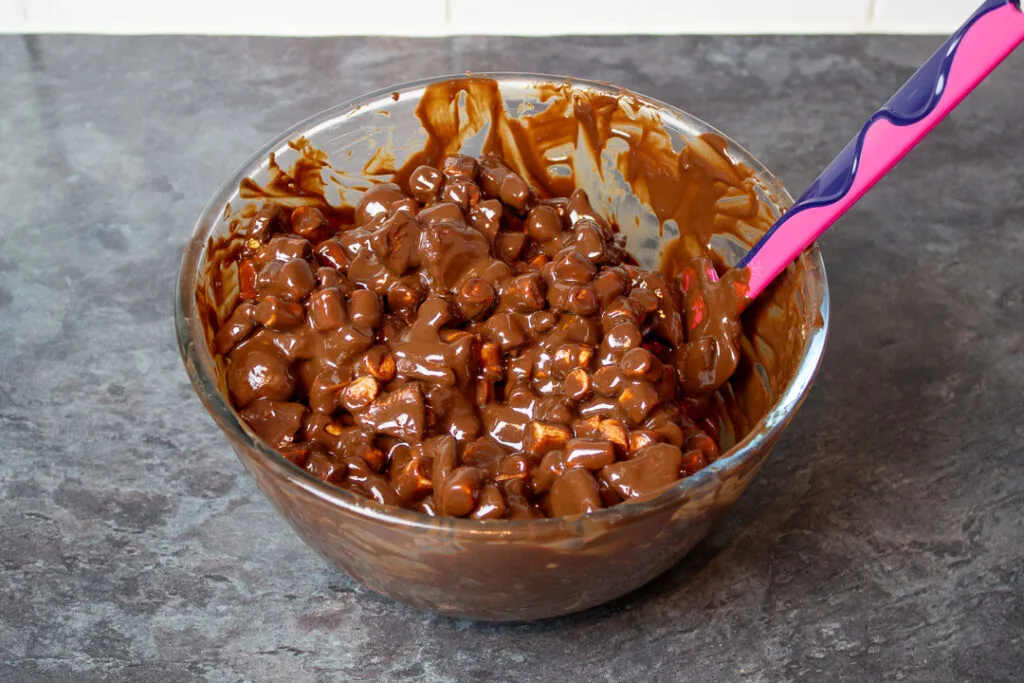 Rocky road mixture in a large mixing bowl.
