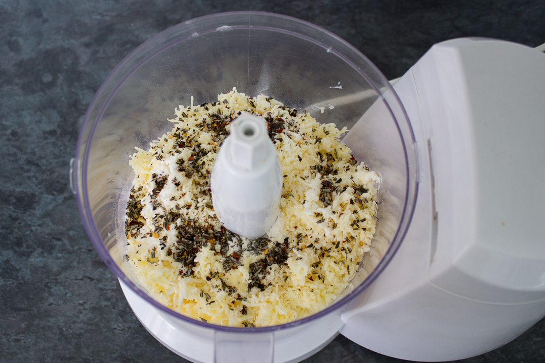 The dry ingredients in a food processor.