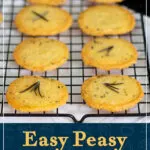 Spicy rosemary crackers cooling on a wire rack. A text overlay says "easy peasy spicy rosemary crackers".