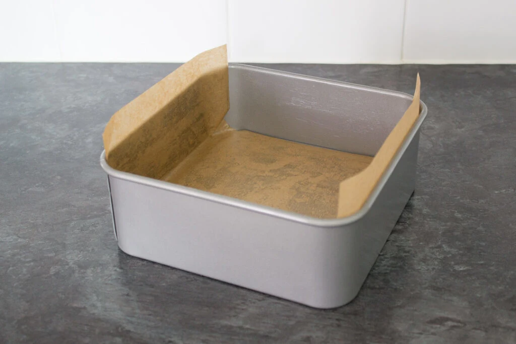A lined square baking tin.
