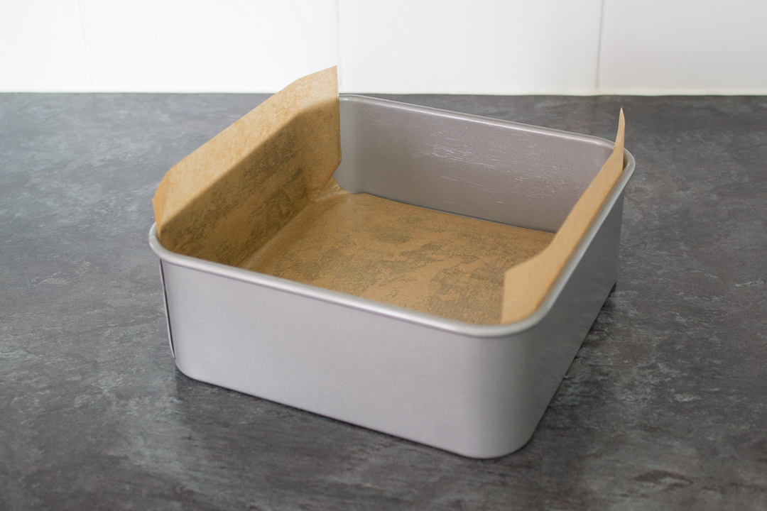 A lined square baking tin.