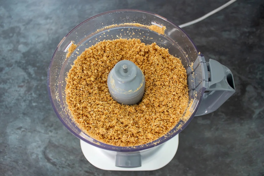 Biscuit crumbs and melted butter in a food processor.