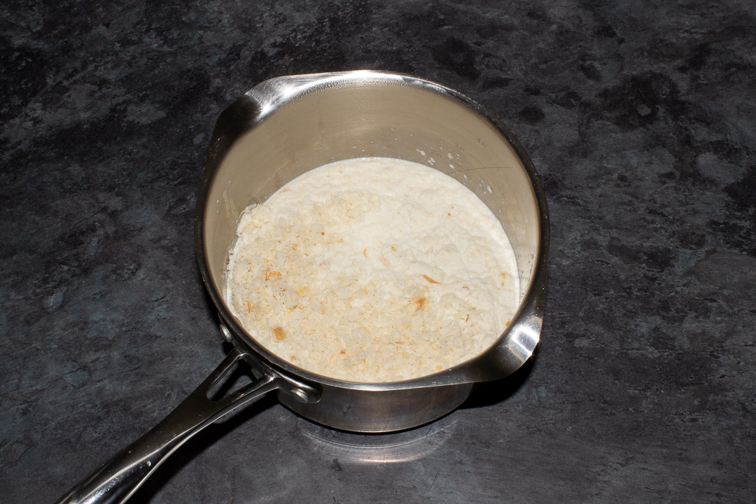 Bread sauce ingredients in a saucepan.
