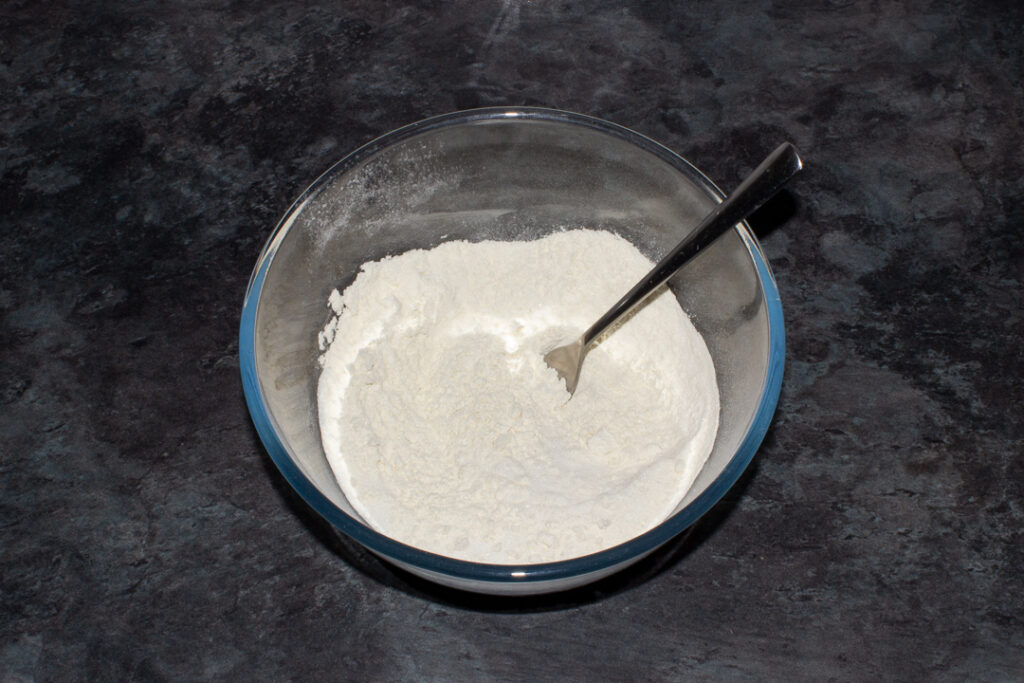Drop scone dry ingredients in a glass mixing bowl with a fork.