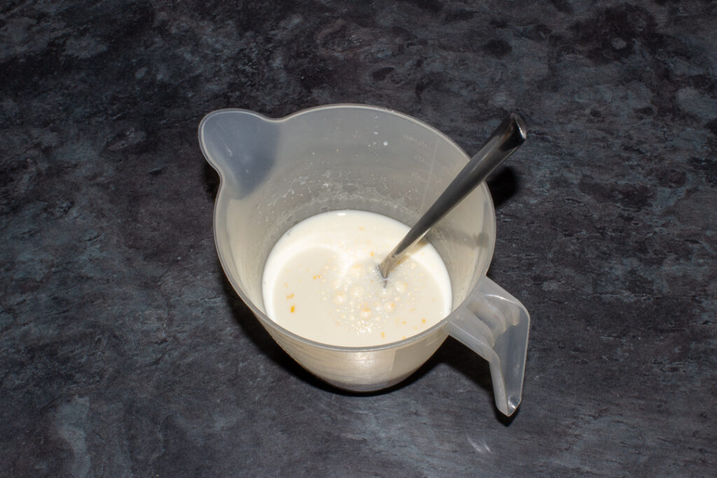 Milk and egg beaten together in a jug.