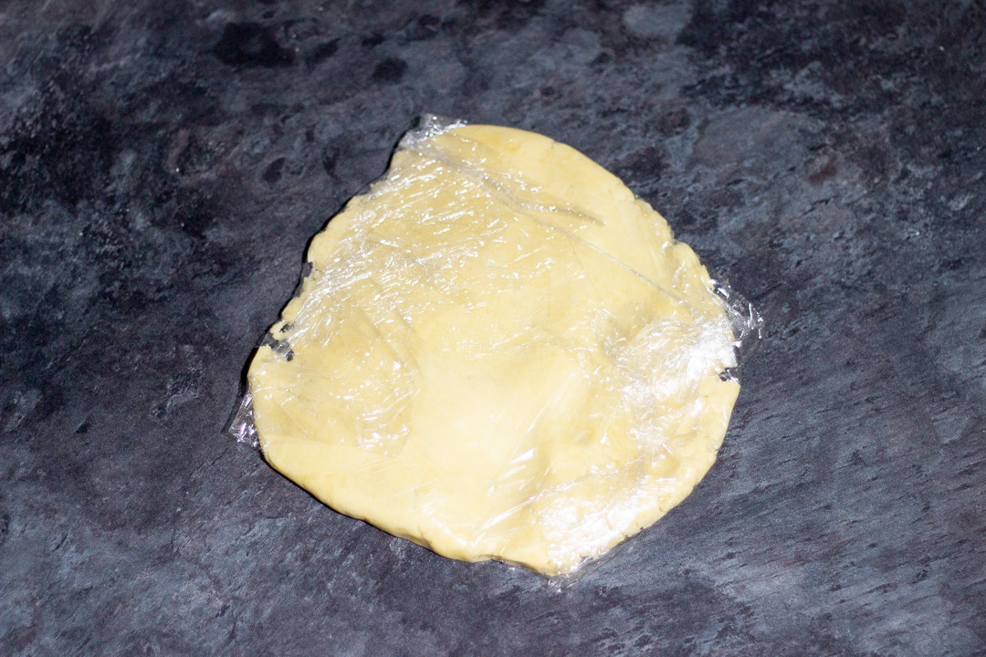 Biscuit dough wrapped in clingfilm.