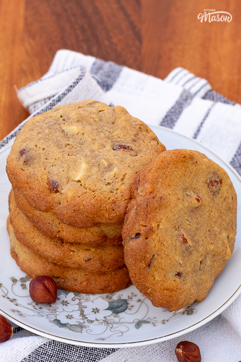 A small plate filled with nut biscuits.