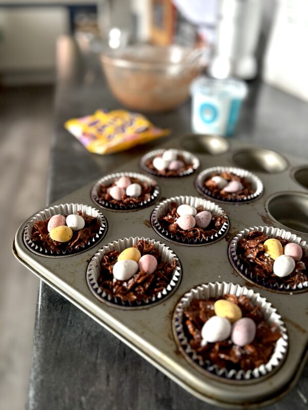 Close up of a tray of freshly made Easter cornflake cakes.