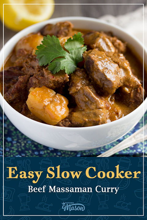 A bowl full of slow cooked beef massaman curry topped with fresh coriander. A text overlay says "Easy slow cooker beef massaman curry".