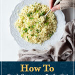 Someone forking fluffy couscous on a decorative white plate.
